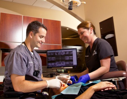 A photo of Dr. Henninger with Patient